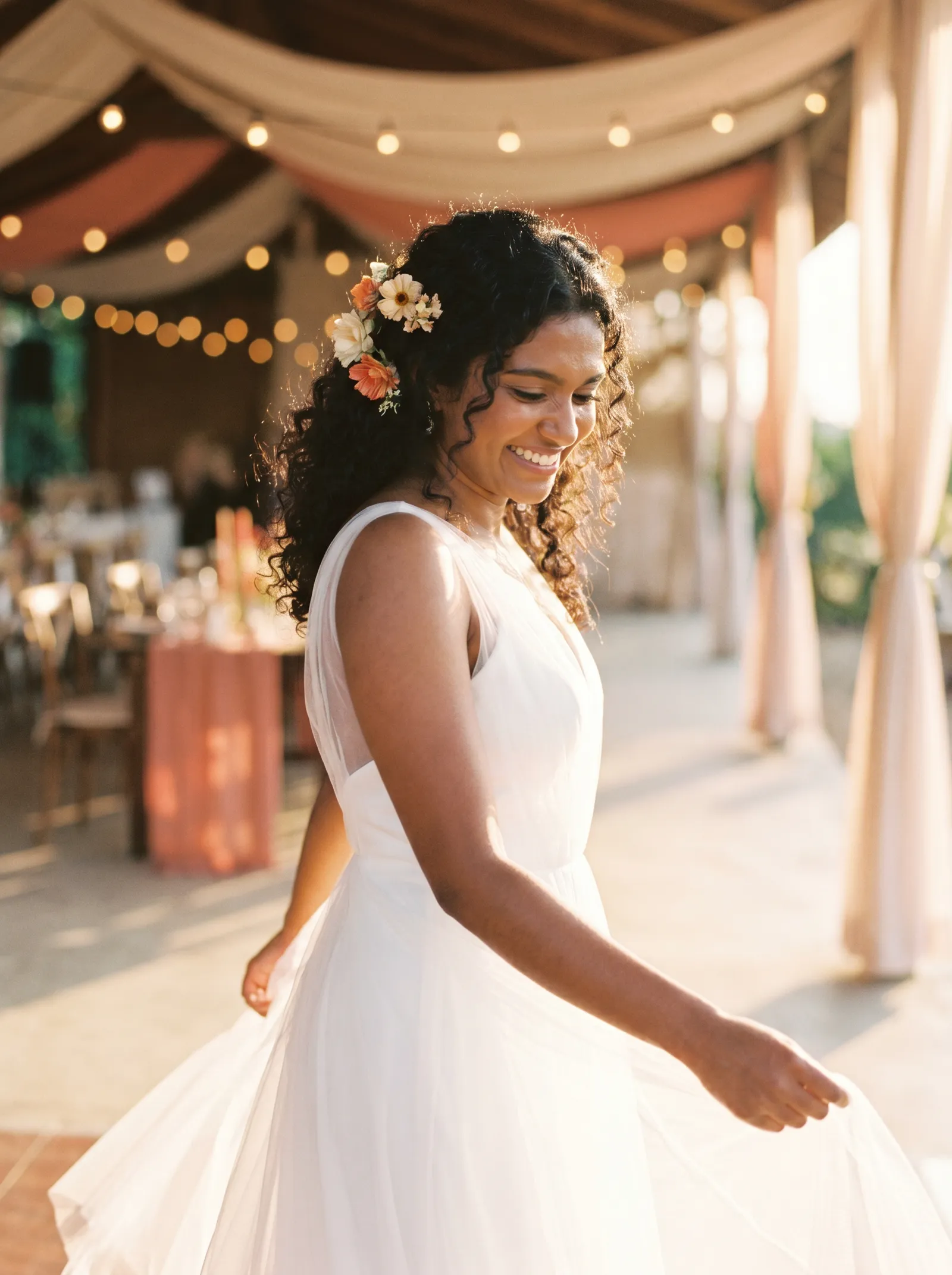 Bride flipping through theme swatches · golden hour